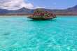 Crystal rock in the turquoise waters of the Indian Ocean near Benitiers Island Mauritius