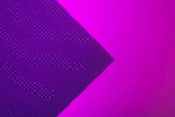 Neon gradient of blue, purple, violet and pink colors abstract textured geometric paper  background.