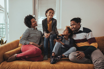 Canvas Print - Catching up on their favorite tv shows together