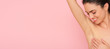 canvas print picture - Close up of female armpit isolated on pink background. Smooth and fresh skin after shaving.