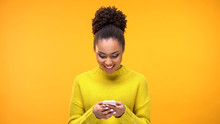 Smiling African-American Woman Chatting On Smartphone, Modern Technology, App