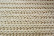 beige knit fabric closeup background