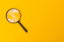 Magnifying Glass On Yellow Background