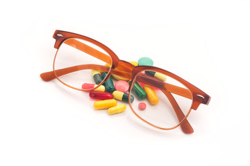 Wall Mural - Vision glasses and pills vitamins for improving the eyes