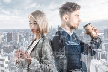 Wall Mural - double exposure of handsome businessman and pretty businesswoman and new york cityscape