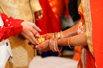 Indian wedding  photography ,groom and bride hands