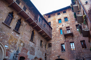 Wall Mural - Juliet's House Gothic-style 1300s house and museum, with a stone balcony, said to have inspired Romeo and Juliet is a tragedy written by William Shakespeare, Verona, Italy, Europe