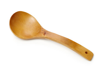 Wooden kitchen spoon on white background