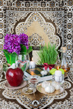 Fototapeta Tulipany - Tabletop with Haft-seen elements for Nowruz