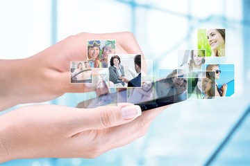 Canvas Print - Hands holding smartphone  on background