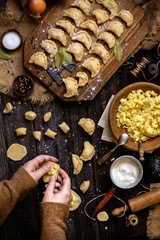 Overhead shot process of making homemade dumplings with potato