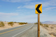 © Rialto Images/Stocksy - Turn ahead sign along remote desert road