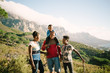 © Bruce and Rebecca Meissner/Stocksy - Family on a hike