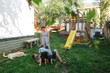 © Rob and Julia Campbell/Stocksy - Family together in back yard