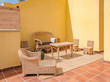 Bambu sofas in a terrace of a summer holiday property.