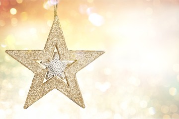 Poster - Golden Christmas star decoration on background