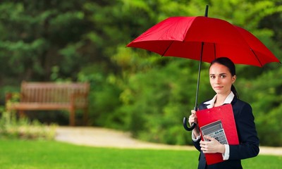 Sticker - Beautiful businesswoman portrait with umbrella , isolated.