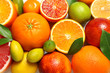 © New Africa - Many different citrus fruits as background, top view