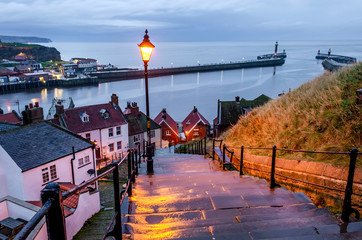 A view of the famous Whitby harbour from the 199 steps on the East cliffs leading to Whitby Abbey.