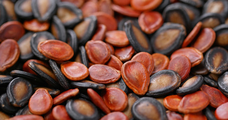 Canvas Print - Stack of mix of black and red melon seed for lunar new year snack