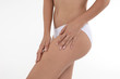 © borabalbey - Checking cellulite, woman hip, close up of beautiful female body on white background.