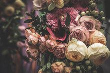 Flower Arrangement Of Different Colors. The Photo Is Processed In Vintage Style, Toning And Light Blur.
