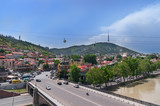Fototapeta Las - Georgia. Tbilisi. Bridge and cable car cabin