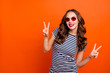 © deagreez - Close up portrait of charming funny funky nice glad optimistic with toothy beaming smile she her lady eyeglasses demonstrating v-sign symbol isolated vivid background copyspace