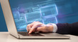 © ra2 studio - Hand typing on laptop with online accounting system concept