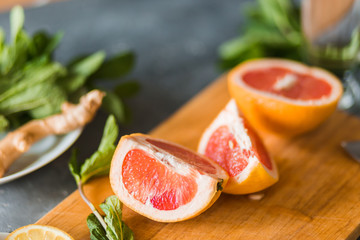 Wall Mural - Citrus and lemonade on the table in summer