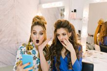 Two Fashionable Attractive Models With Stylish Makeups, Luxury Coiffures Having Fun Together In Haidresser Salon. Friends Together, Making Selfie, Expressing True Positive Emotions, Joy, Beauty