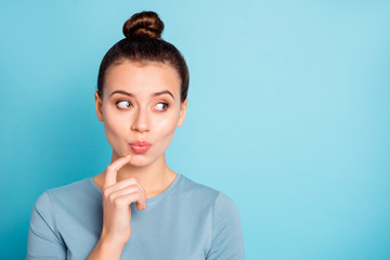 Wall Mural - Close up photo of minded youth youngster touch chin finger look thought future reaction  rumor gossip secret dressed in modern spring cotton clothes isolated on blue background