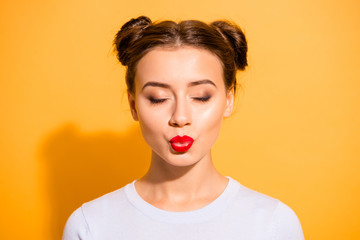 Wall Mural - Close-up portrait of her she nice attractive winsome lovely sweet cheerful glam girl sending you kiss plump lips closed eyes isolated over bright vivid shine yellow background