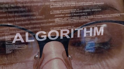 Algorithm text on the background of female software developer. Eyes of woman with glasses are looking at programming network code space abstract technologies connecting global data network