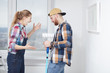 © alfa27 - Mad and furious woman shouting in anger and rage, being displeased with her husband behavior while they are doing renovation in house