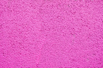 Wall Mural - pink painted on concrete wall texture background.