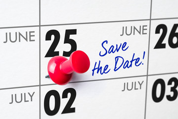 Wall calendar with a red pin - June 25