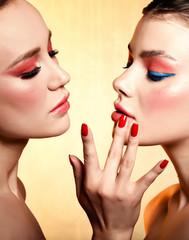 two beautiful girl portrait with coral color makeup