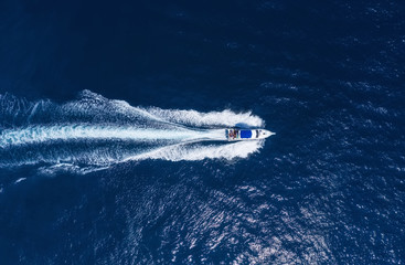 Wall Mural - yachts at the sea in bali, indonesia. aerial view of luxury floating boat on transparent turquoise w
