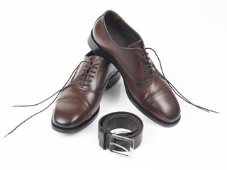 Classic men's shoes, belt  on white background