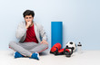 © luismolinero - Sport man sitting on the floor is suffering with cough and feeling bad