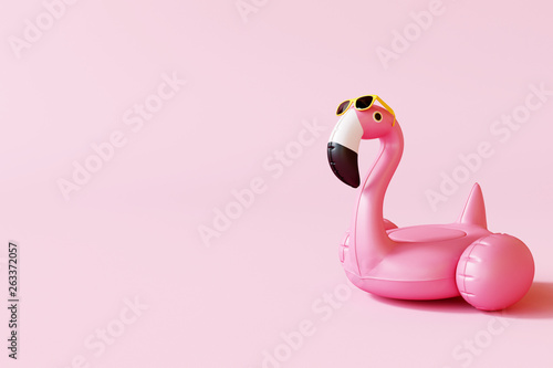 Cuadros en Lienzo Flamingo float with sunglasses on pastel pink background
