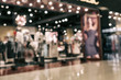 blurred photo of a clothing store in a mall