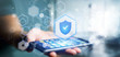 © Production Perig - Man holding a Shield web security concept 3d rendering