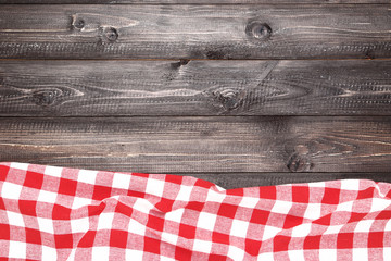 Wall Mural - Red napkin on wooden table