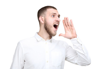 Poster - Young man screaming on white background