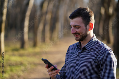 Handsome Bearded Smiling Caucasian Man With Freckles With Short