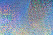 Multicolored abstract rainbow nacre holographic bright background with gradient shining magic with bokeh effect