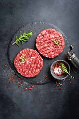 Canvas Print - Fresh raw minced beef steak burgers with spices