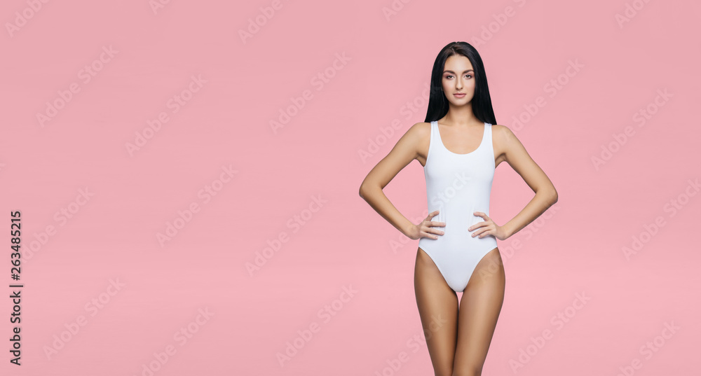Fit and sporty girl in underwear. Beautiful and healthy woman posing in white swimsuit. Slim body. Sport, fitness, diet, weight loss and healthcare concept. - obrazy, fototapety, plakaty 